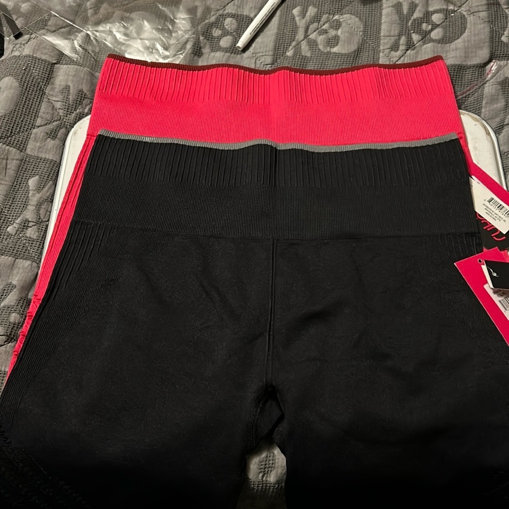 Ryka bike shorts size, large, pink or black